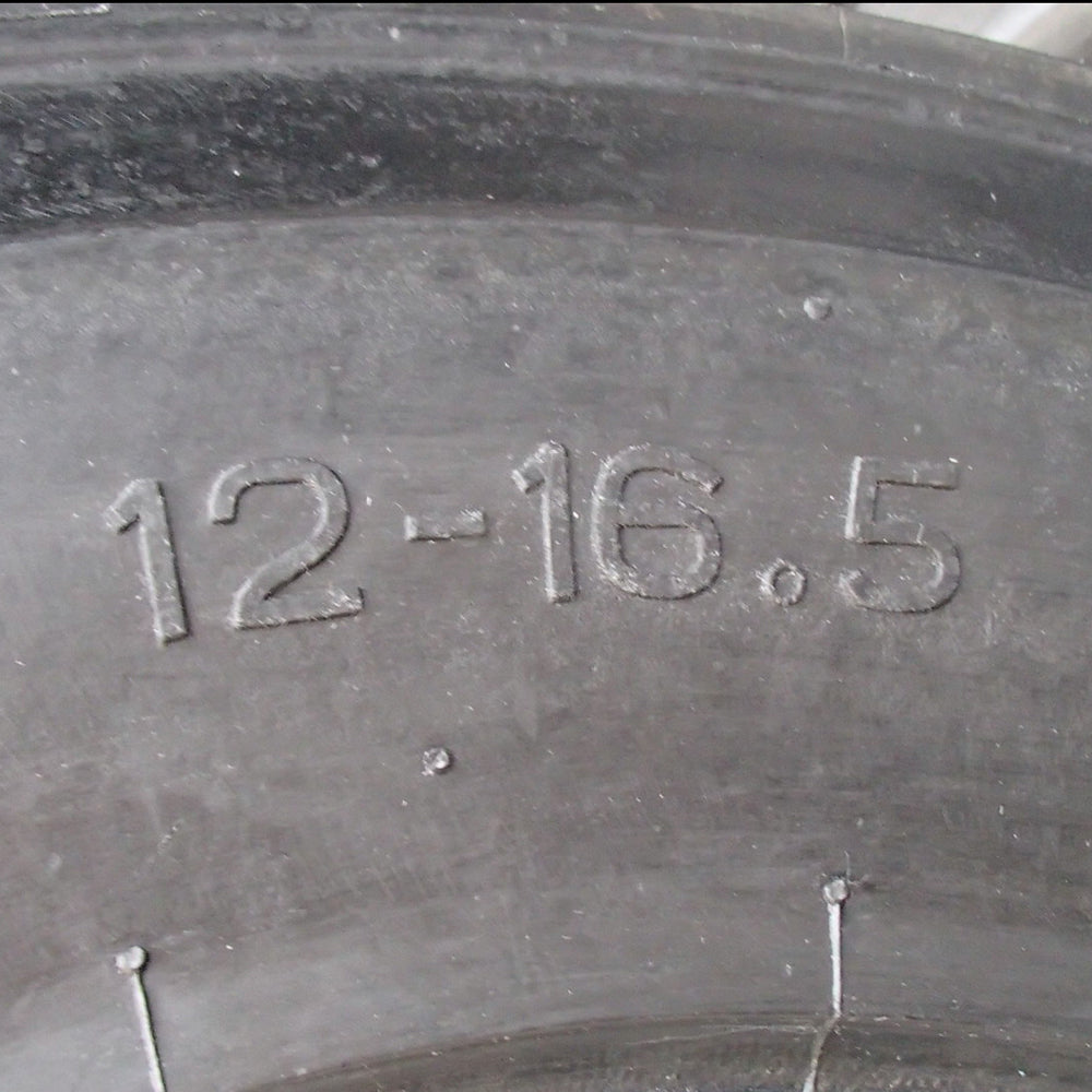 One (1) 12-16.5 Skid Steer Loader 12-Ply Tire 12/16.5 12165