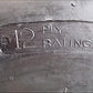 One New Heavy Duty 12-16.5 12-Ply Skid Steer Tire w/ Rim Guard Fits Bobcat